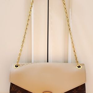 Authentic Louis Vuitton 98% New .